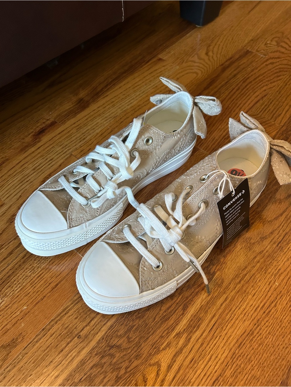 Converse Women’s Beige Lace-Up Low Top Sneakers with Bow Accent